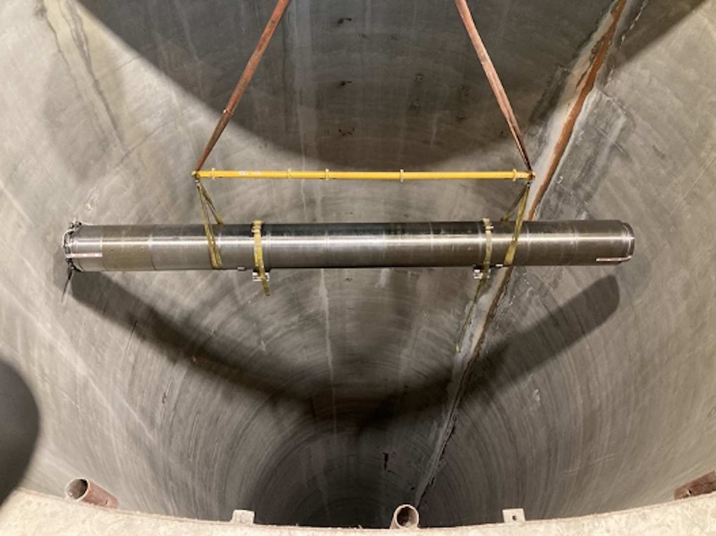 A beam dumps being lowered into the accelerator tunnel 