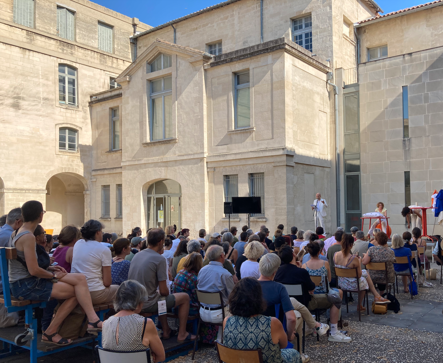 Group of people watching a performance