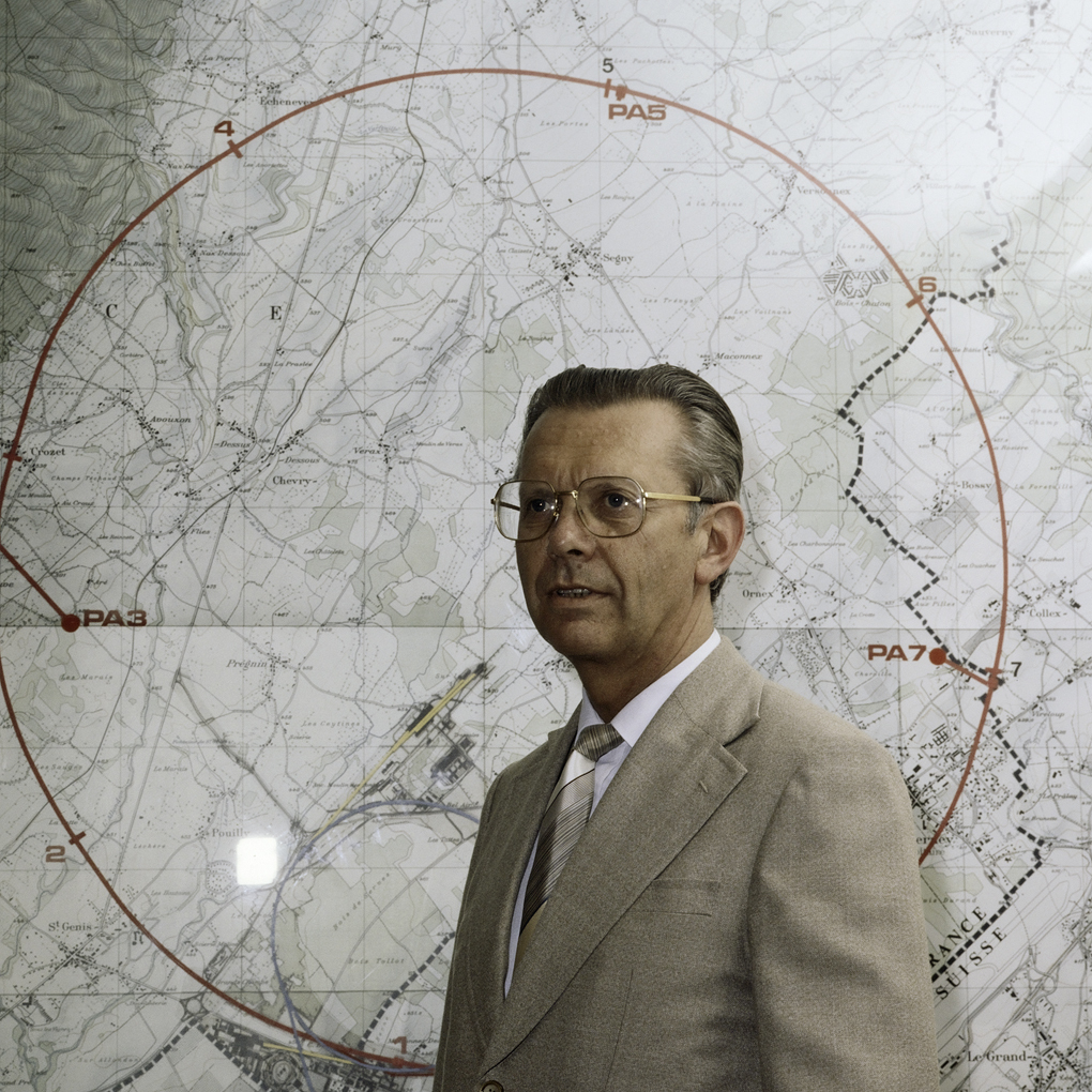 Man in front of a map