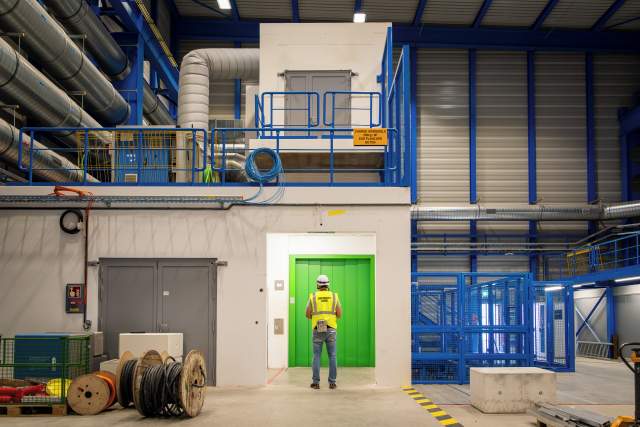 “-72.2” by Matteo Monzali. A worker waiting for the lift to take him 72.2 m below the surface from where he can access the new HL-LHC cavern at LHC Point 1.