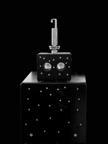 “I see you” by Margit Pinggera. Real scientific instrument used to take measurements of various objects, including the vertical piece depicted here.