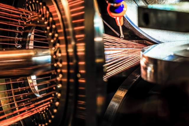 “Threading the Future” by Erik Kuna, third place, voted by the CERN community. Picture taken at CERN’s so-called superconducting laboratory (Building 163). This unique wiring machine in CERN’s high-temperature superconducting laboratory combines dozens of strands of niobium–tin (Nb3Sn) to create the Rutherford cables for 11-tesla-magnet coils.